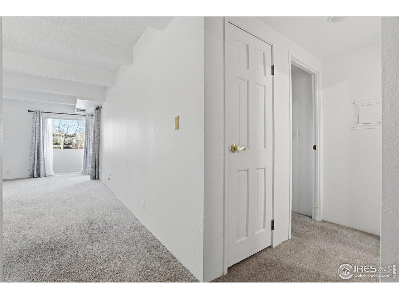 415 South Howes Street, Unit N206 Fort Collins, CO 80521 - Photo 7 of 48 a view of an empty room and window