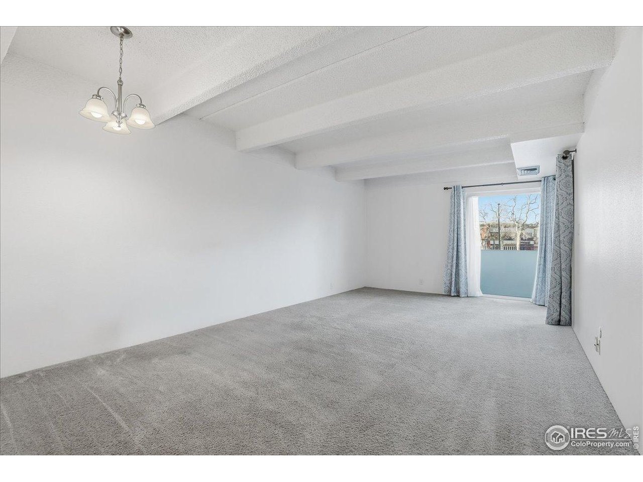 415 South Howes Street, Unit N206 Fort Collins, CO 80521 - Photo 8 of 48 a view of empty room with window