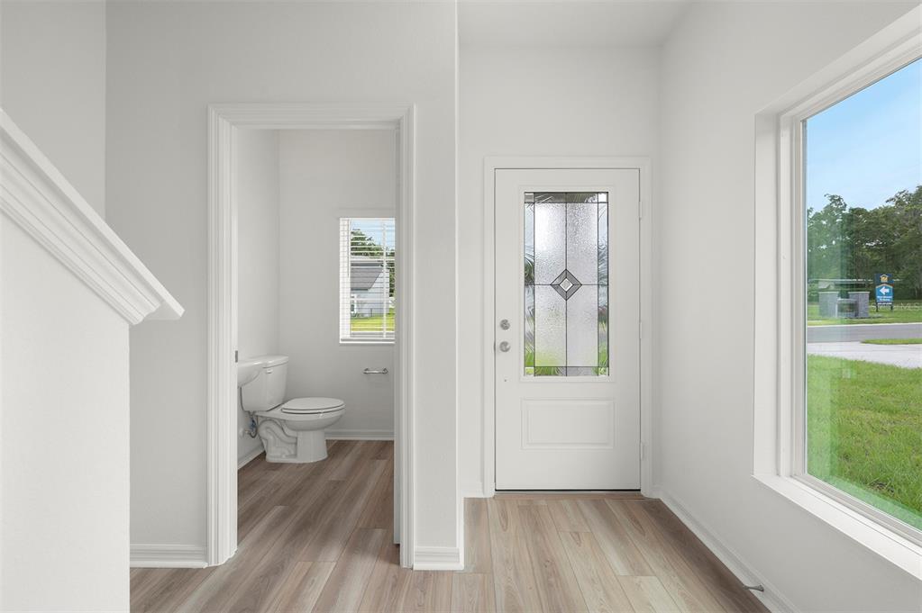 13291 Tula Loop Astatula, FL 34705 - Photo 9 of 22 a bathroom with a toilet and a shower