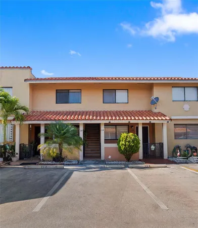 front view of a house with a street