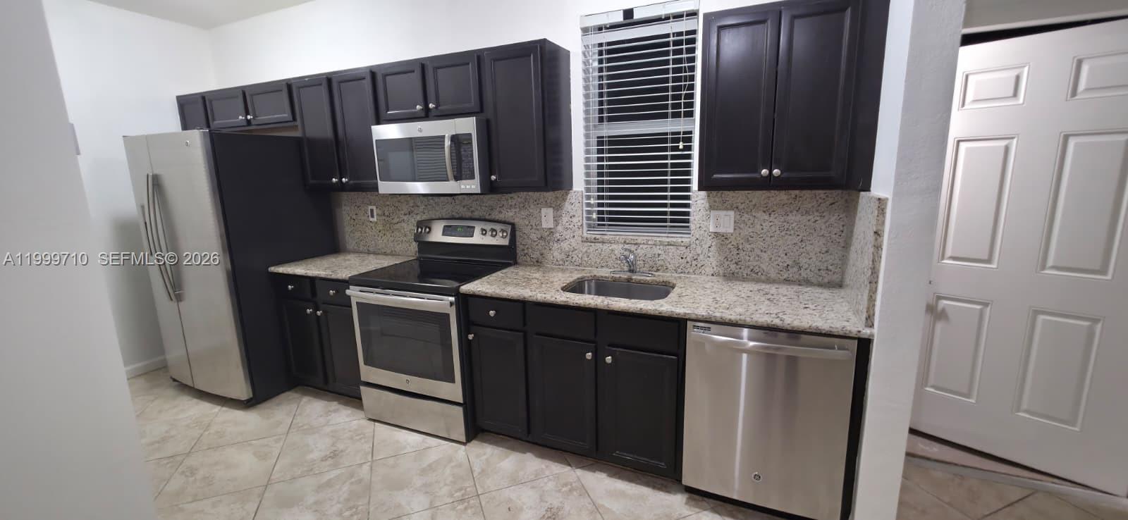 9160 Southwest 171st Court, Unit STUDIO Miami, FL 33196 - Photo 9 of 10