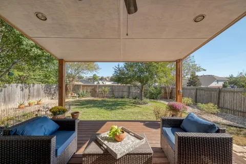 a view of a patio with couches chairs dining table and chairs