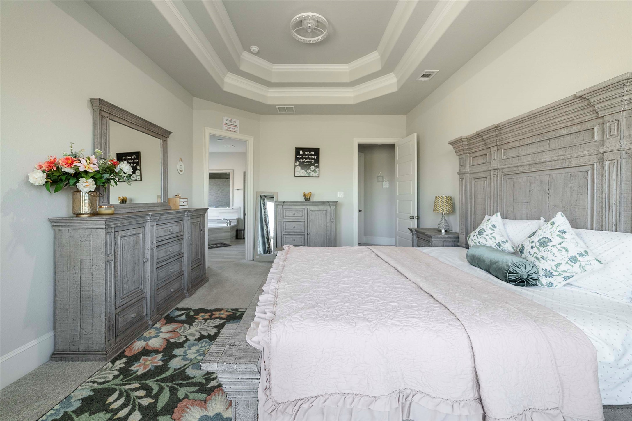 17821 Limestone Spring Lane Austin, TX 78738 - Photo 20 of 40 a bedroom with a bed and a dresser