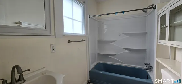 a bathroom with a tub