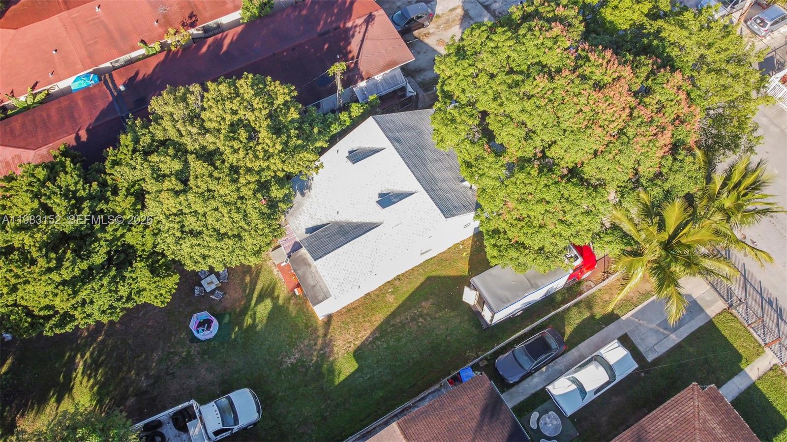 2142 Northwest 33rd Street Miami, FL 33142 - Photo 3 of 26 an aerial view of a house