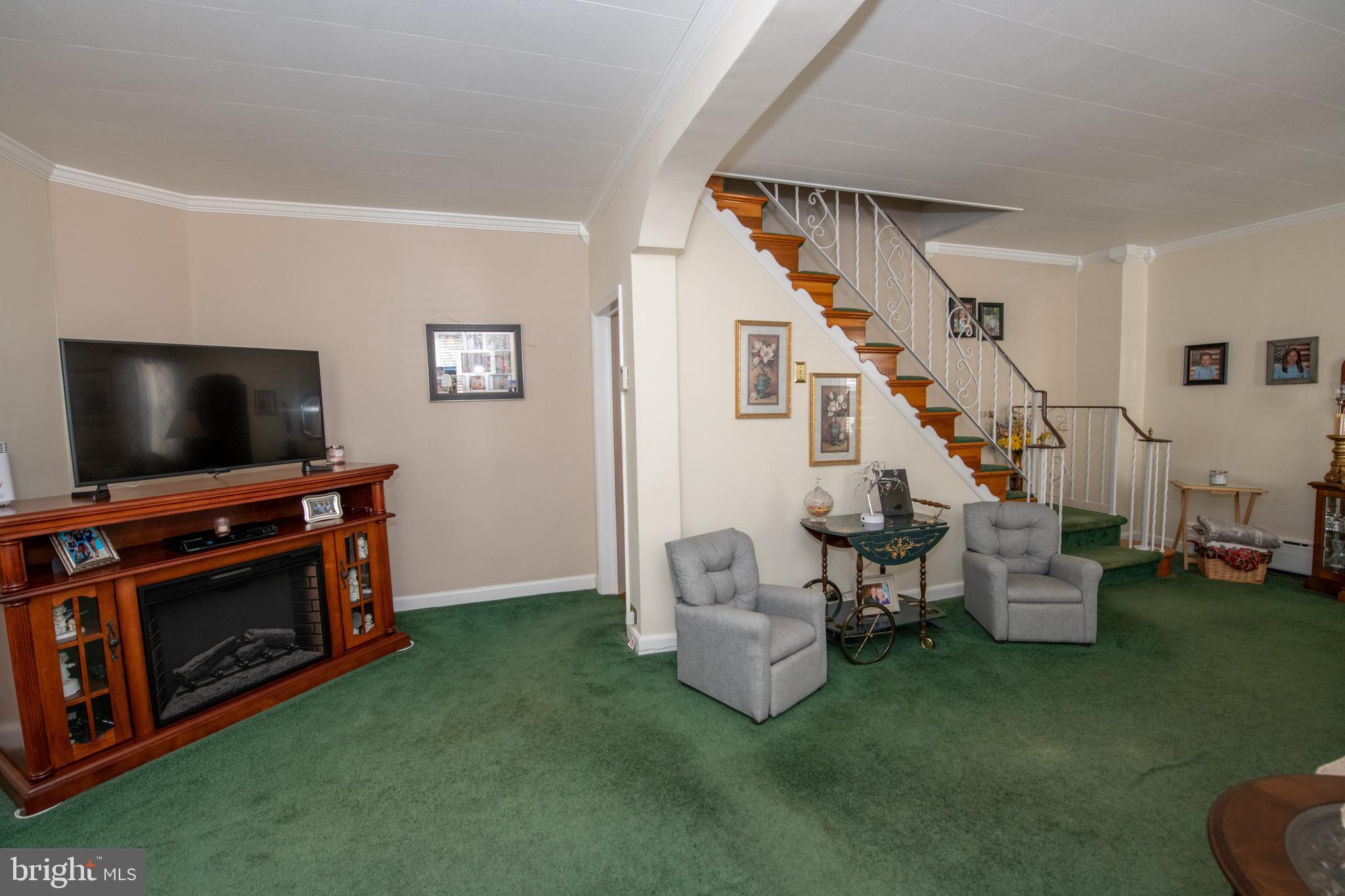 2740 Pratt Street Philadelphia, PA 19137 - Photo 13 of 45 a living room with furniture and a flat screen tv