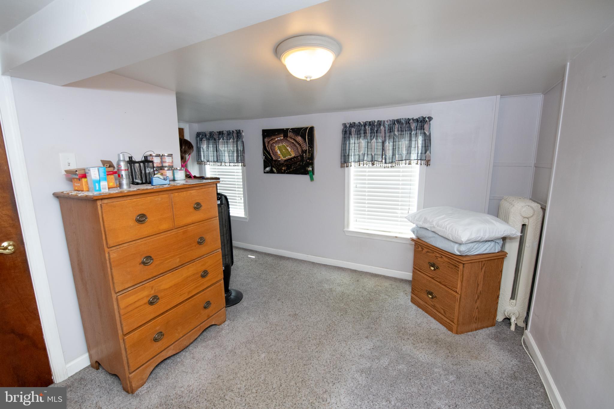 2740 Pratt Street Philadelphia, PA 19137 - Photo 33 of 45 a room with furniture and a dresser