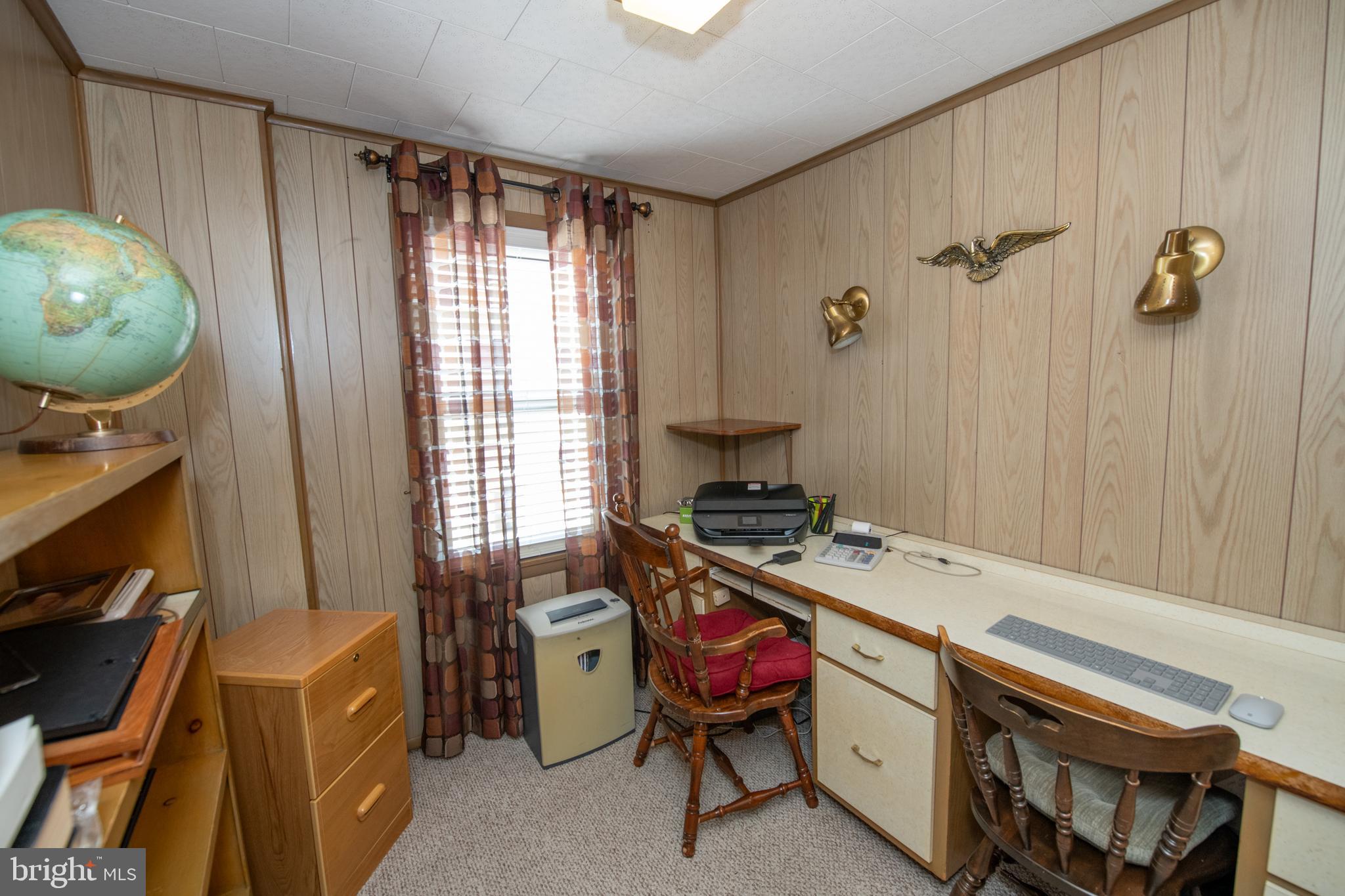 2740 Pratt Street Philadelphia, PA 19137 - Photo 35 of 45 a room with a chair and a table