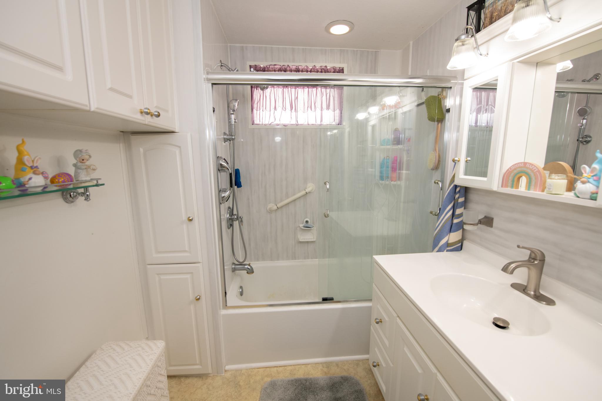 2740 Pratt Street Philadelphia, PA 19137 - Photo 38 of 45 a bathroom with a sink a toilet and shower