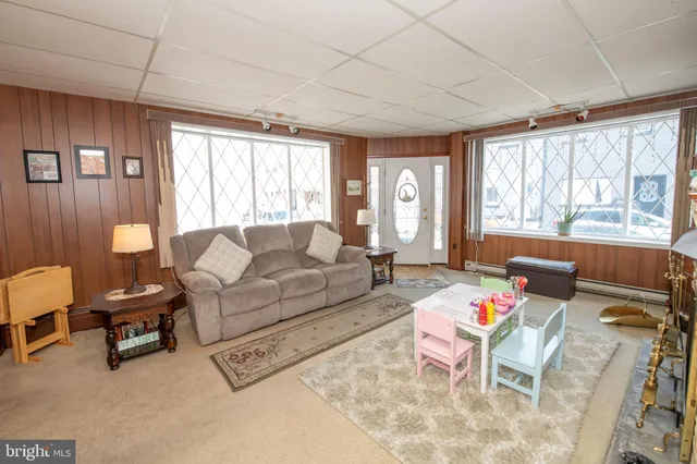 a living room with furniture and a couch