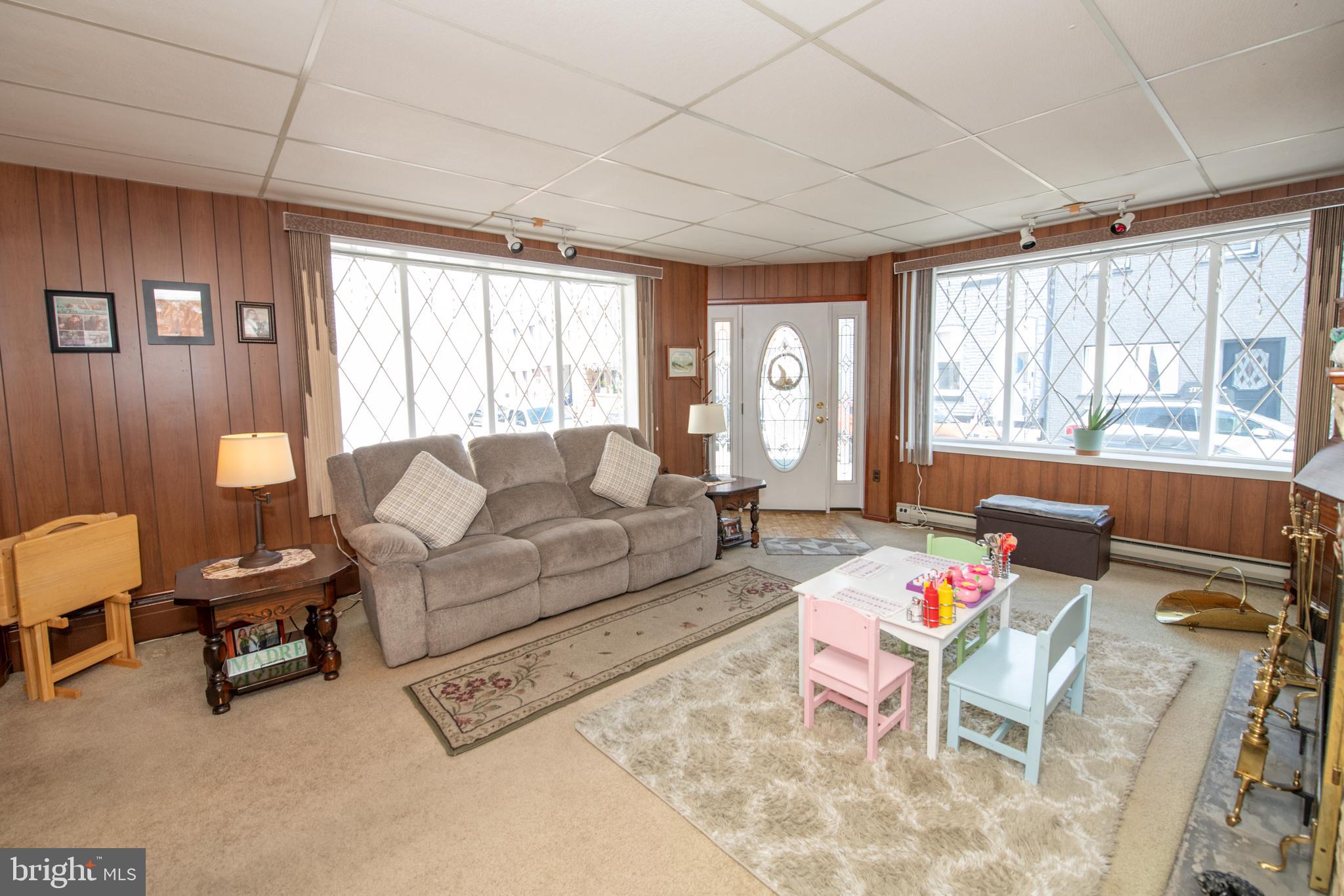 2740 Pratt Street Philadelphia, PA 19137 - Photo 9 of 45 a living room with furniture and a large window