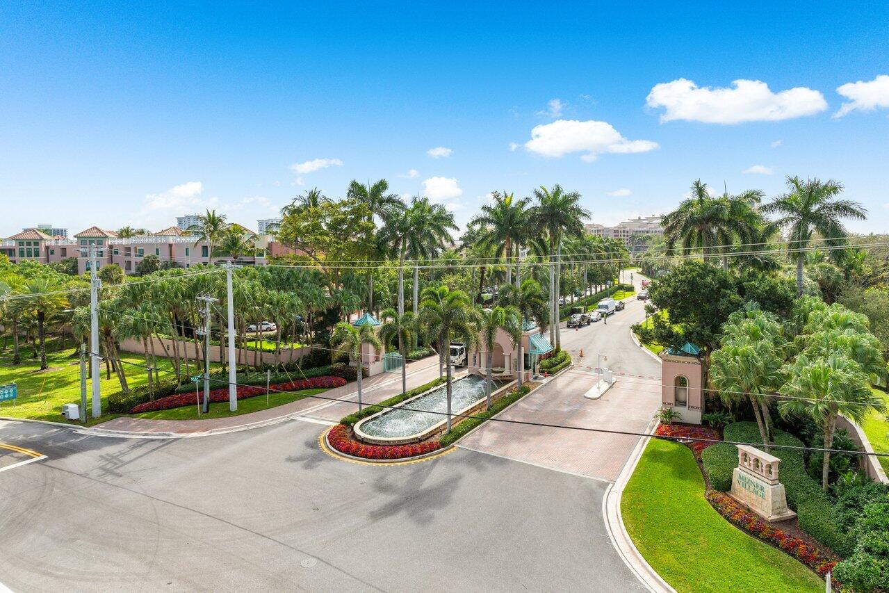 495 East Royal Palm Road, Unit 402 Boca Raton, FL 33432 - Photo 50 of 72 a view of a swimming pool with a garden
