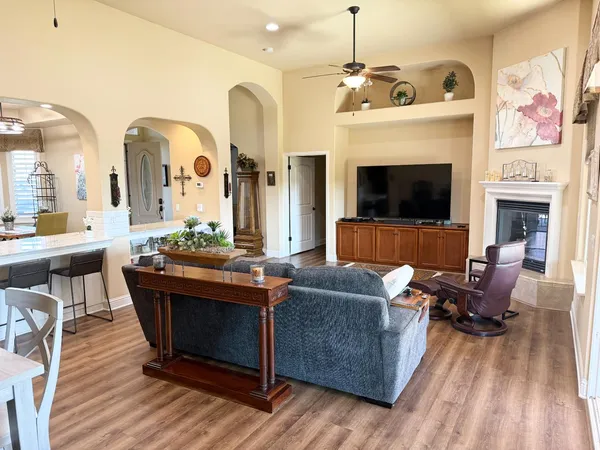 a bedroom with a bed and a table in it