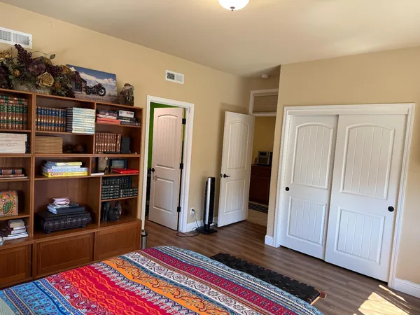 a room with furniture and gym equipment