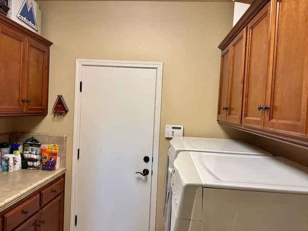 a room with furniture and a book shelf
