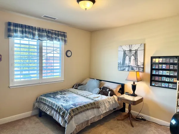 a room with furniture and a window