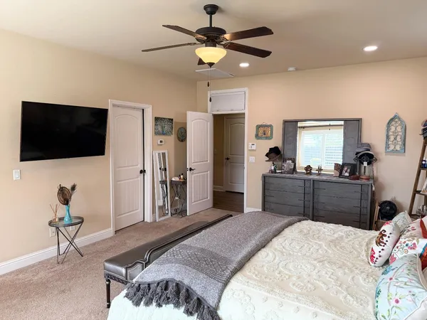 a view of a two chairs in the patio