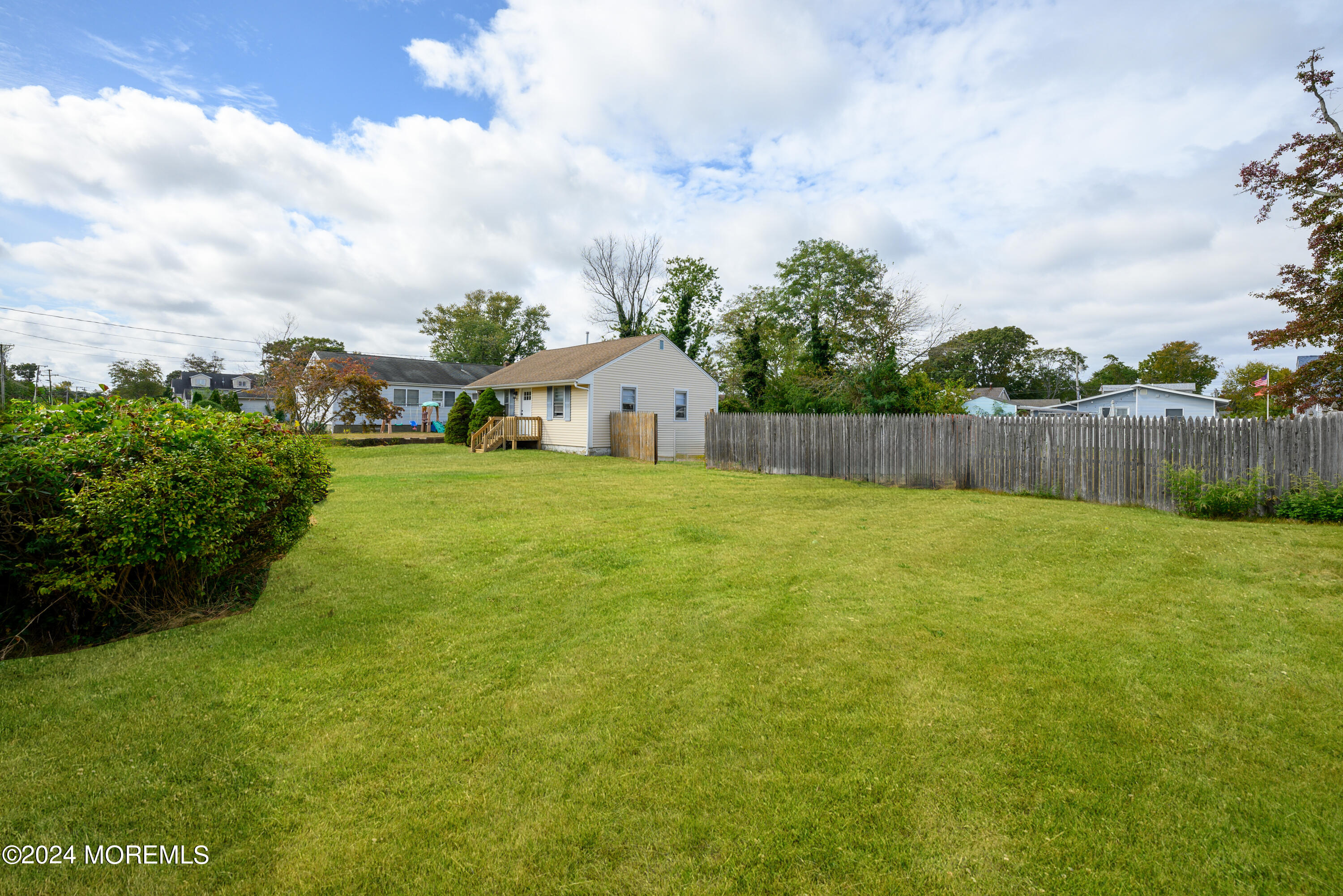 554 Lillie Road Toms River, NJ 08753 - Photo 2 of 26 a view of a back yard