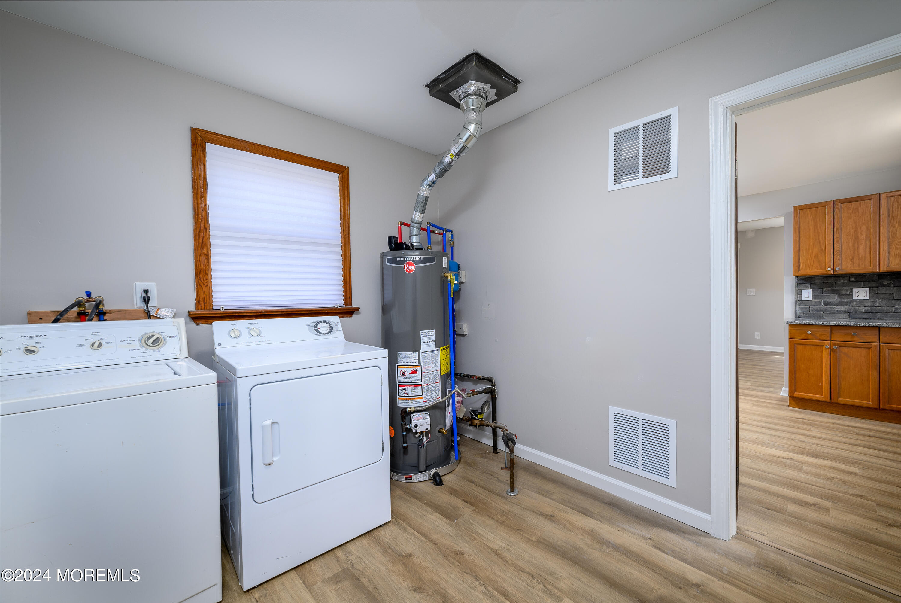 554 Lillie Road Toms River, NJ 08753 - Photo 22 of 26 a view of storage and utility room with washer and dryer