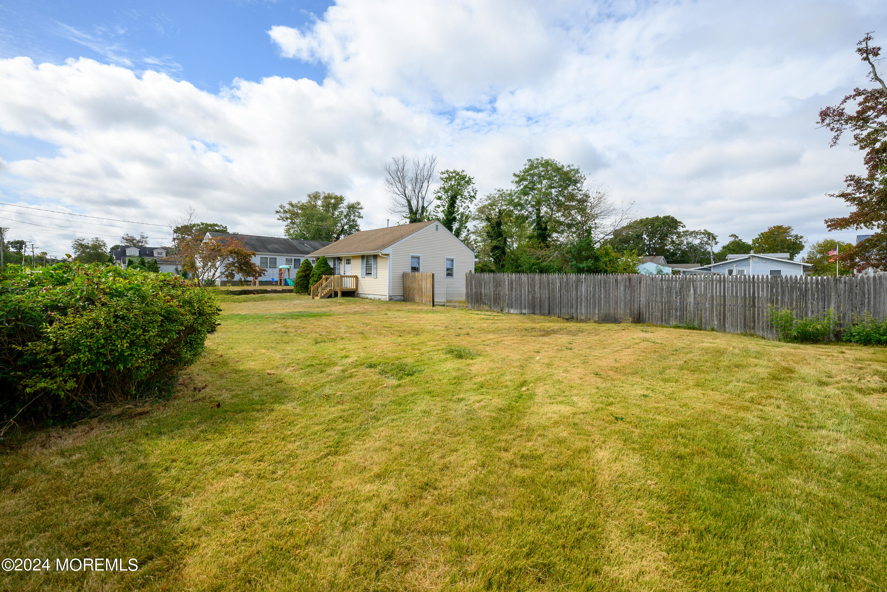 554 Lillie Road Toms River, NJ 08753 - Photo 23 of 26 a view of a swimming pool with a patio