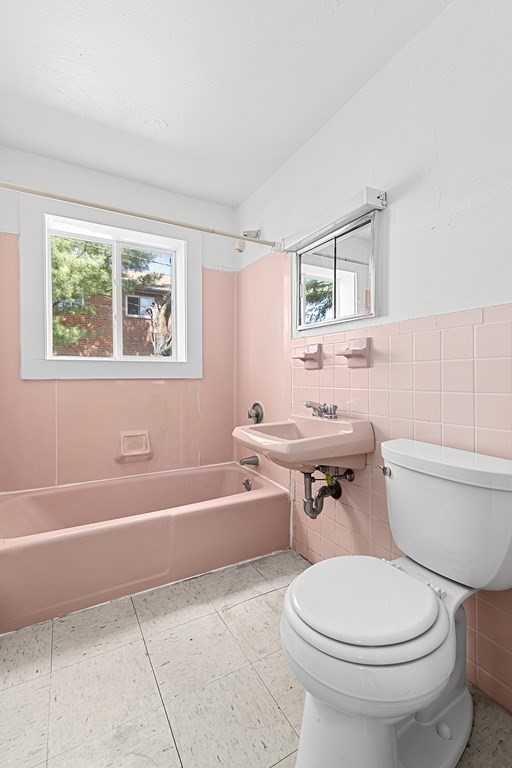 50 Bryon Road, Unit 3 Boston, MA 02467 - Photo 6 of 8 a bathroom with a sink toilet and a bathtub