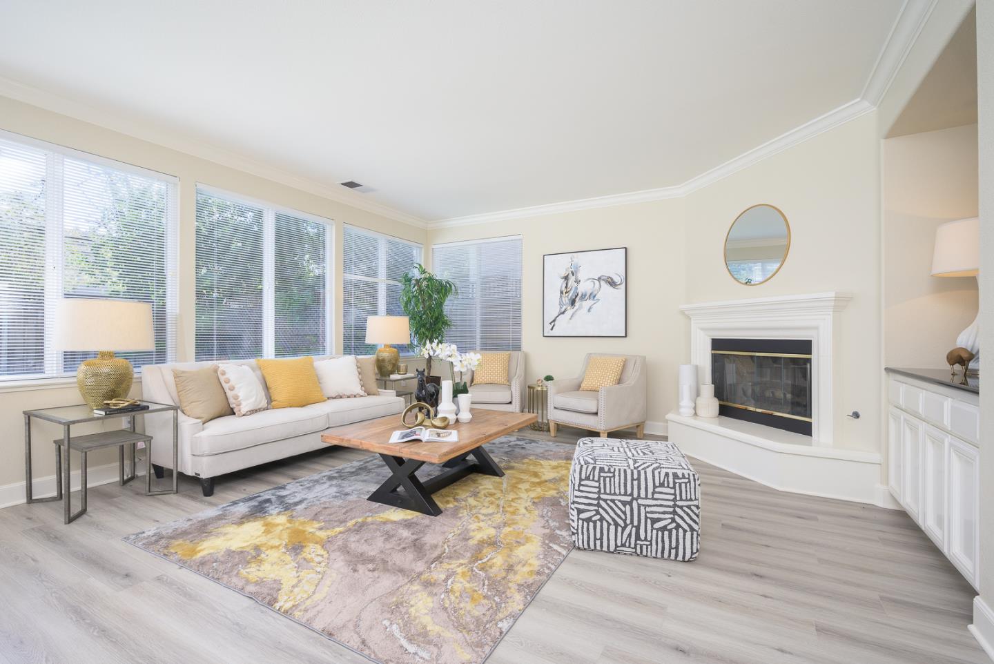 1791 Woodhaven Place Mountain View, CA 94041 - Photo 11 of 26 a living room with furniture large window and a fireplace