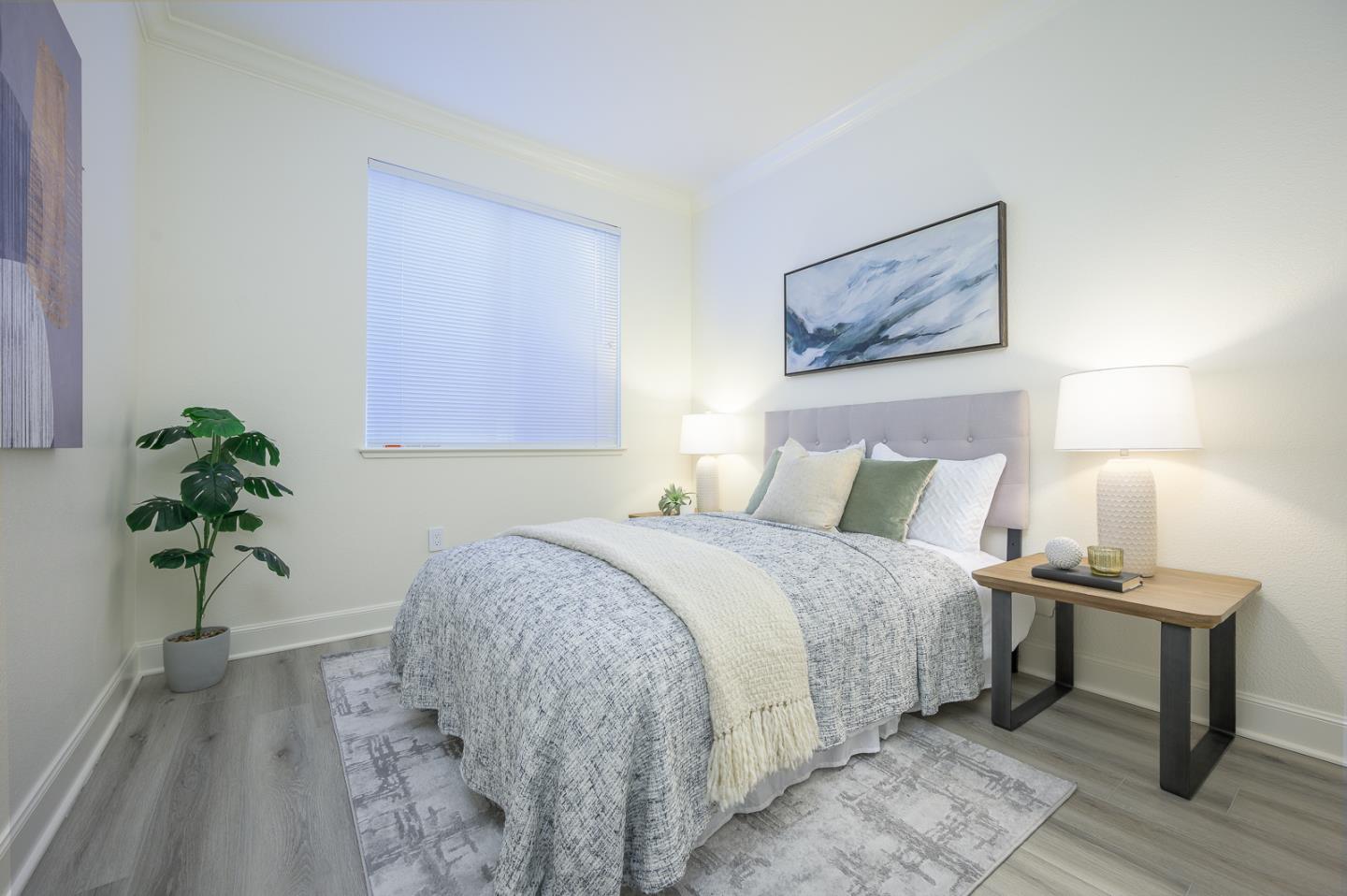 1791 Woodhaven Place Mountain View, CA 94041 - Photo 13 of 26 a bedroom with a bed and a potted plant
