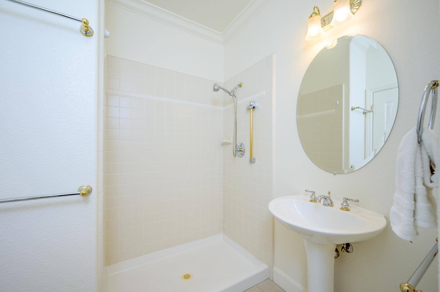 1791 Woodhaven Place Mountain View, CA 94041 - Photo 14 of 26 a bathroom with a sink a mirror and a bathtub