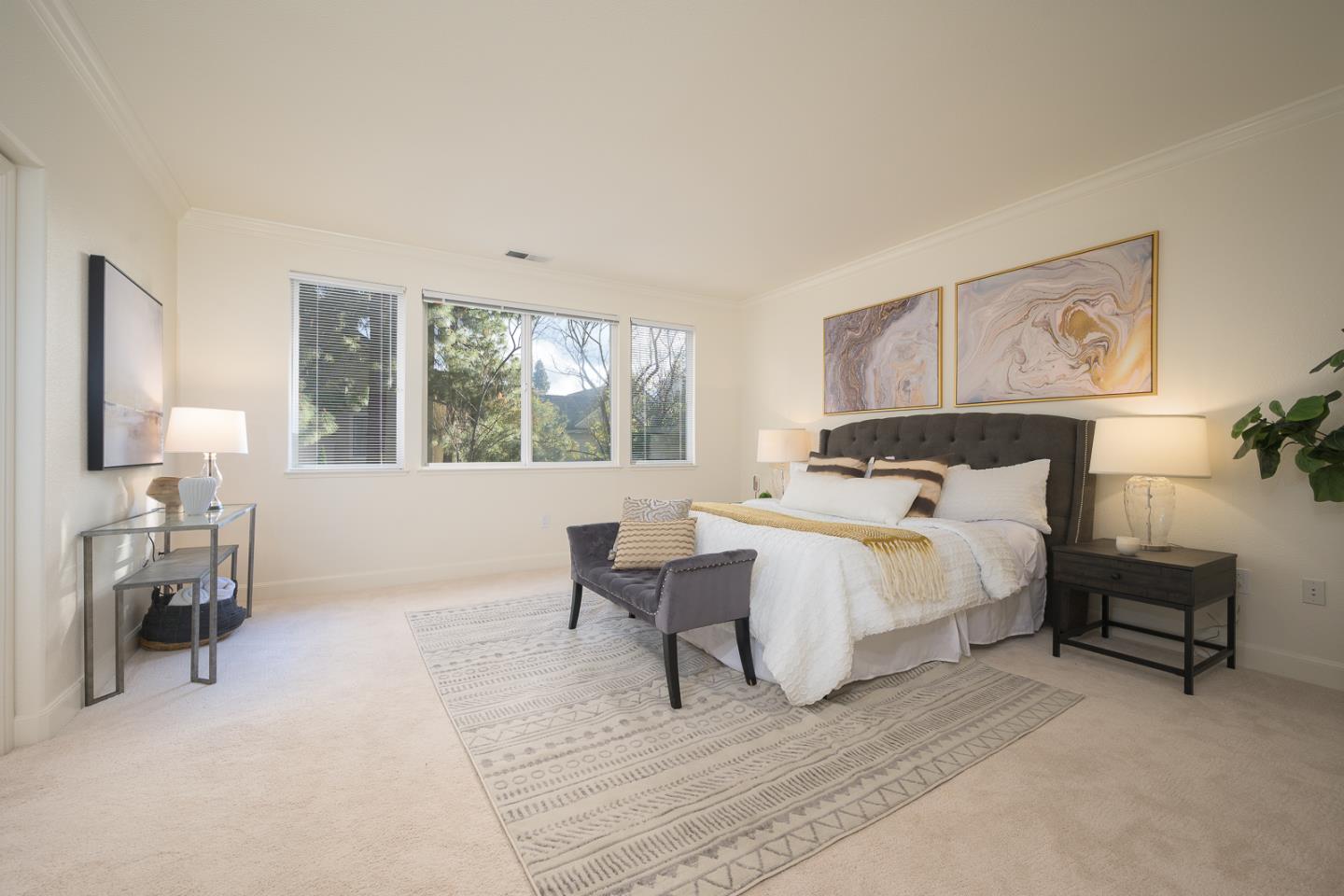 1791 Woodhaven Place Mountain View, CA 94041 - Photo 15 of 26 a bed room with a bed and a chair