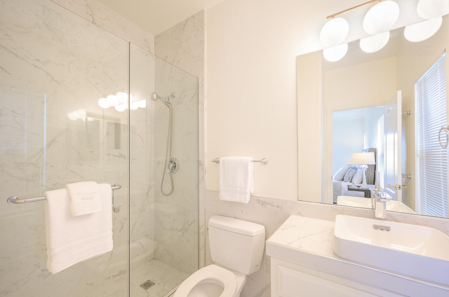 1791 Woodhaven Place Mountain View, CA 94041 - Photo 21 of 26 a bathroom with a sink a toilet and shower