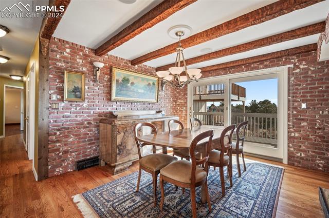 8475 Red Spring Valley Road Colorado Springs, CO 80919 - Photo 10 of 50 Formal dining room with deck access.