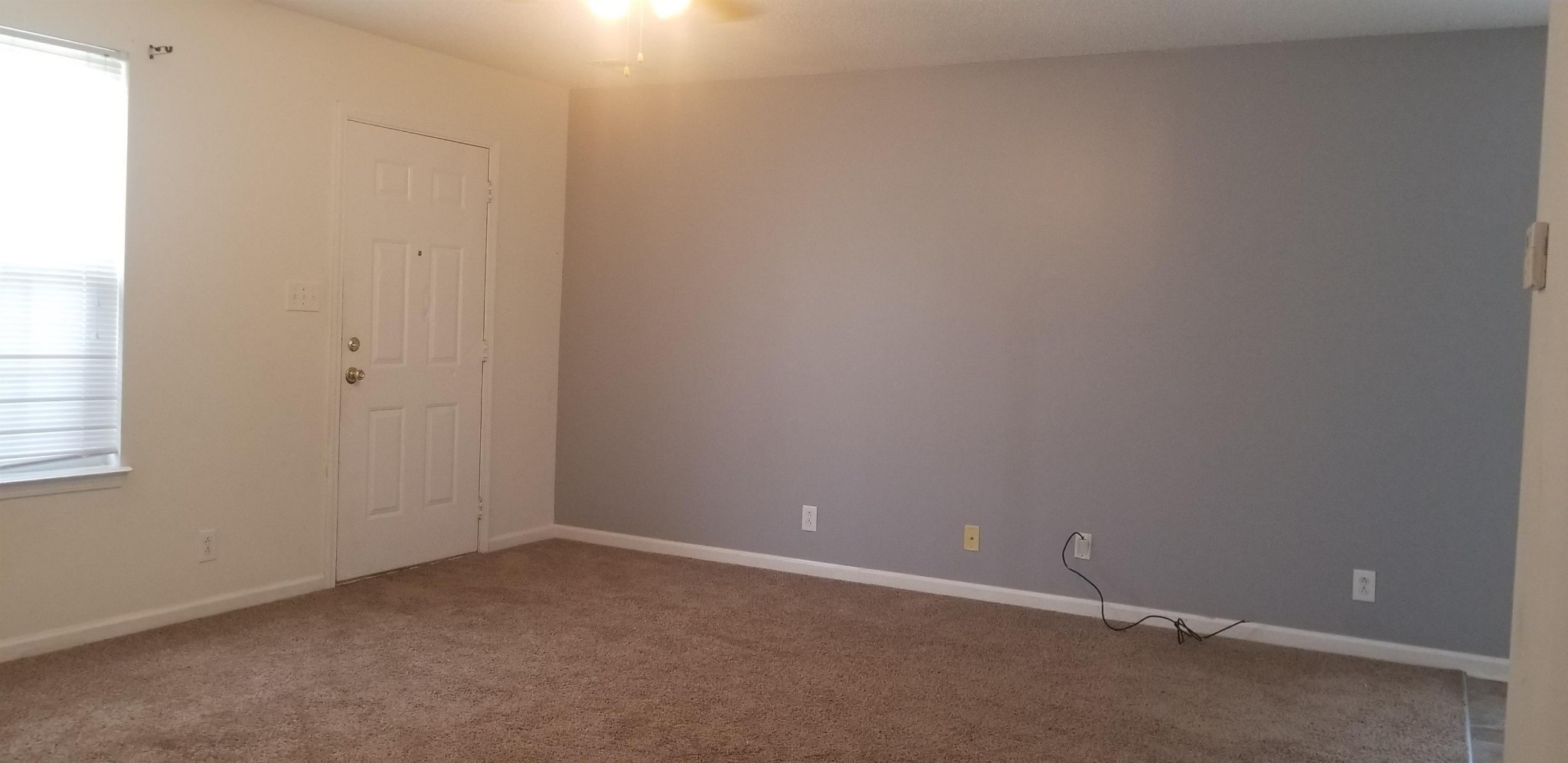 1041 Shadow Ridge Avenue Oak Grove, KY 42262 - Photo 2 of 11 an empty room with a empty space and window