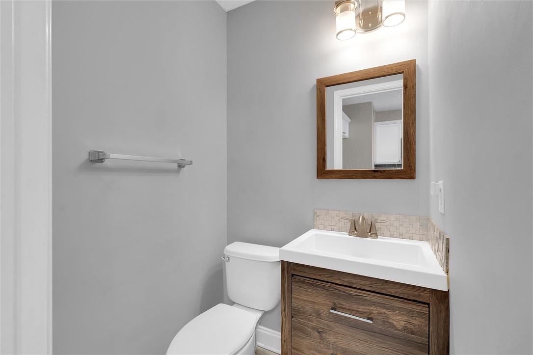 123 Trailside Lane Greenville, SC 29607 - Photo 17 of 29 This clean and bright powder room features a sleek vanity and modern fixtures.