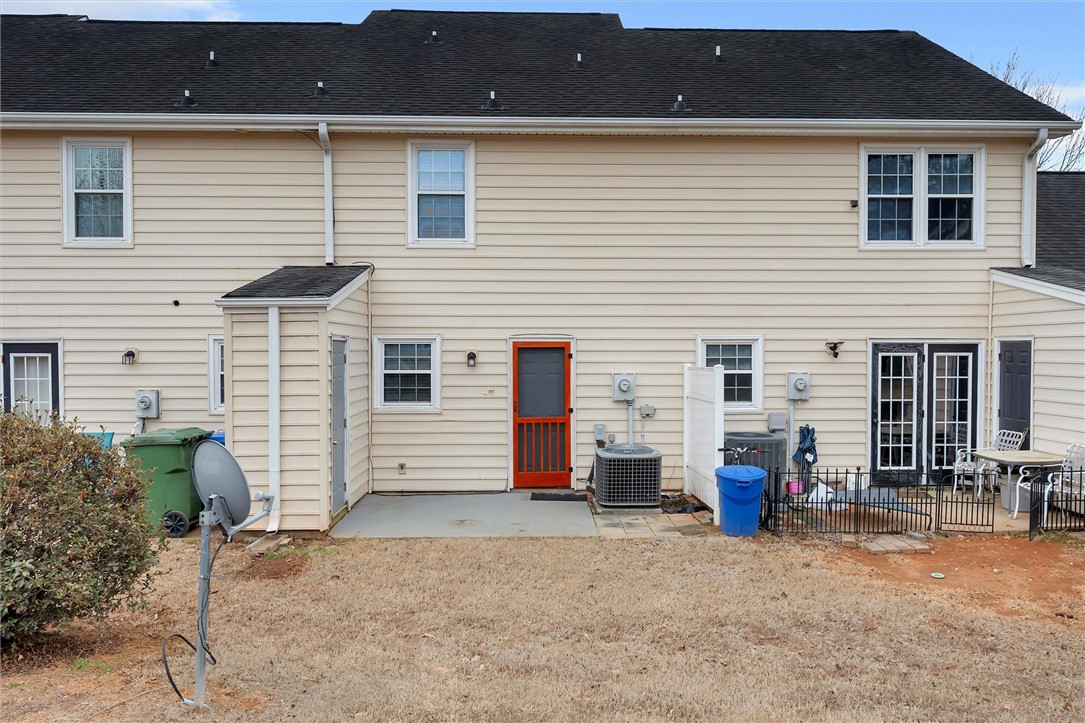 123 Trailside Lane Greenville, SC 29607 - Photo 29 of 29 This residence showcases a well-maintained exterior with a practical backyard space.