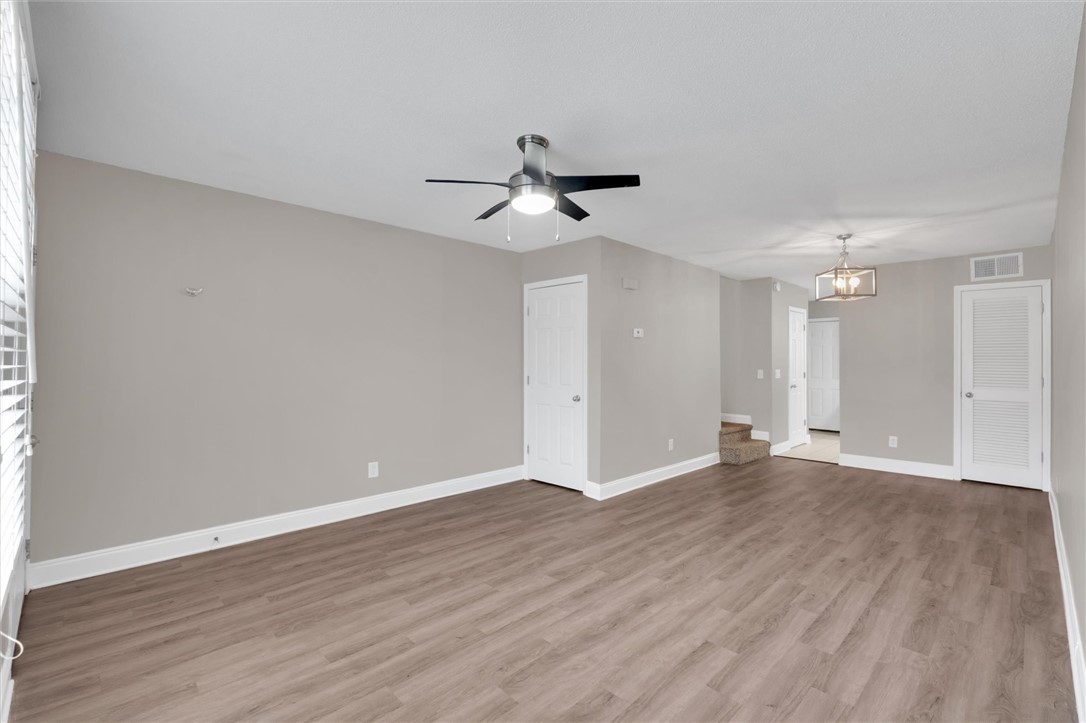 123 Trailside Lane Greenville, SC 29607 - Photo 5 of 29 This bright and open living area offers versatile space with durable flooring and modern fixtures.
