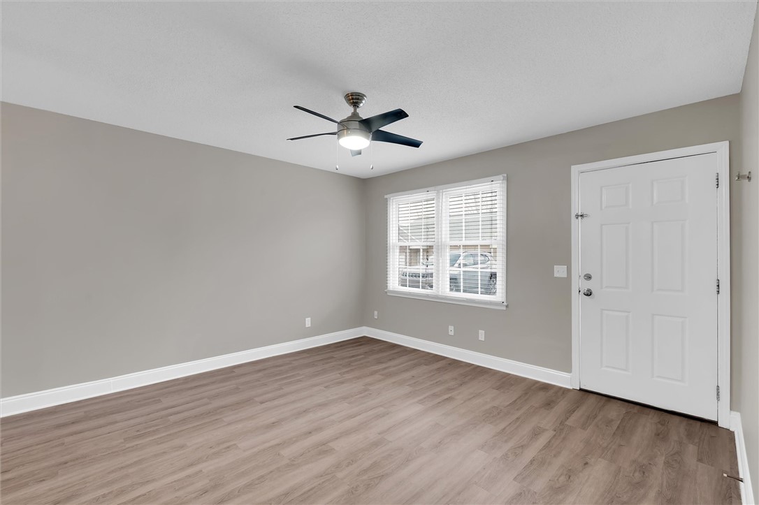 123 Trailside Lane Greenville, SC 29607 - Photo 7 of 29 This inviting space features modern flooring and abundant natural light.