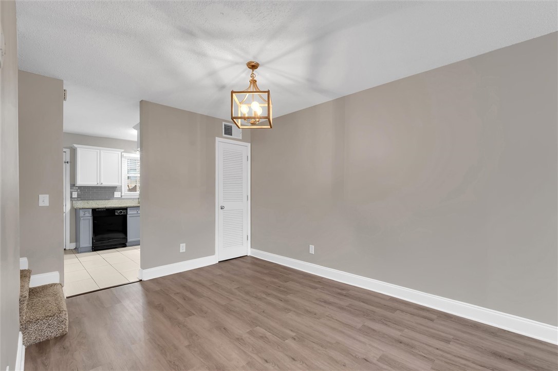 123 Trailside Lane Greenville, SC 29607 - Photo 8 of 29 This inviting space features modern flooring and a classic fixture, creating a comfortable ambiance.