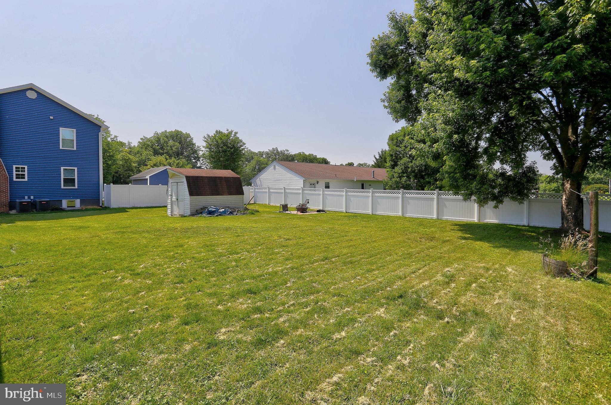 10355 Scaggsville Road Laurel, MD 20723 - Photo 28 of 41 a view of a house with a yard