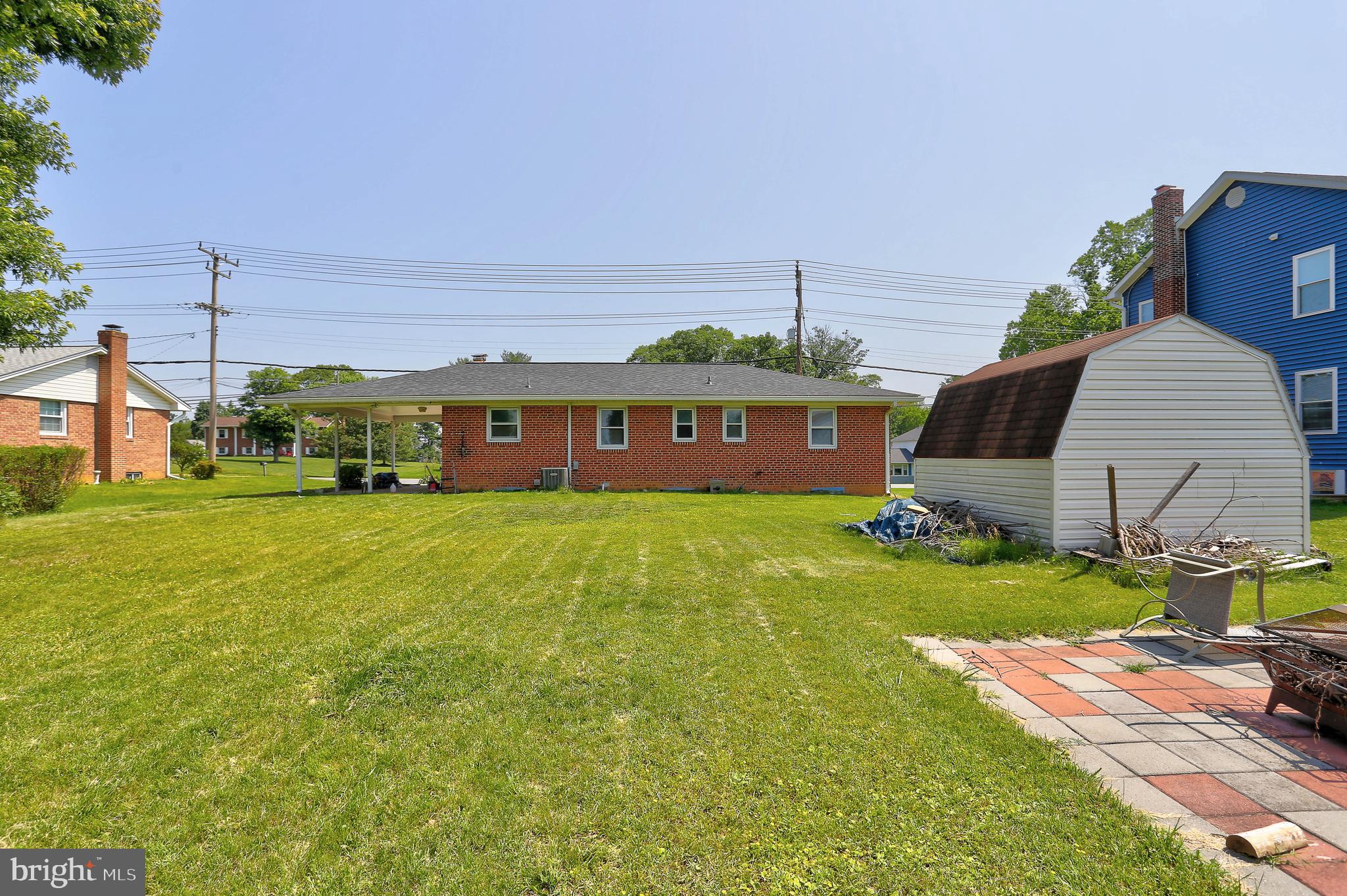 10355 Scaggsville Road Laurel, MD 20723 - Photo 29 of 41 a front view of a house with a garden