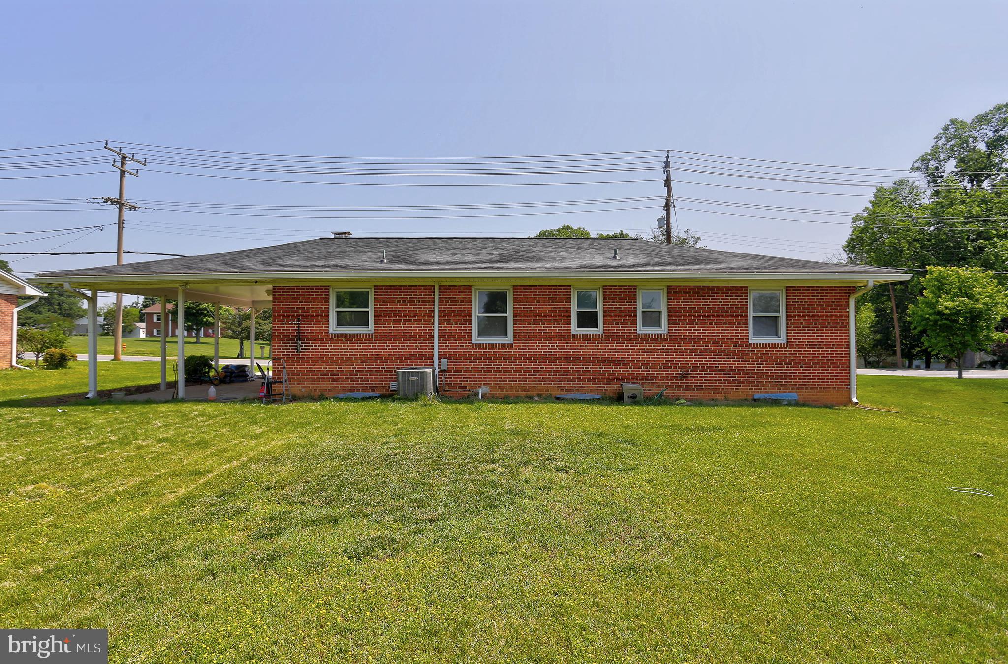 10355 Scaggsville Road Laurel, MD 20723 - Photo 30 of 41 a front view of a house with garden