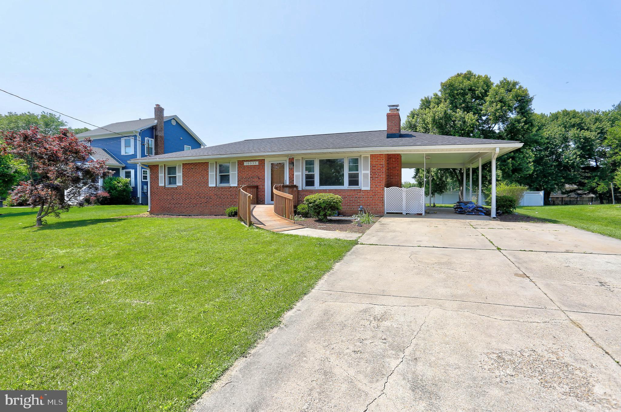 10355 Scaggsville Road Laurel, MD 20723 - Photo 35 of 41 a front view of a house with garden