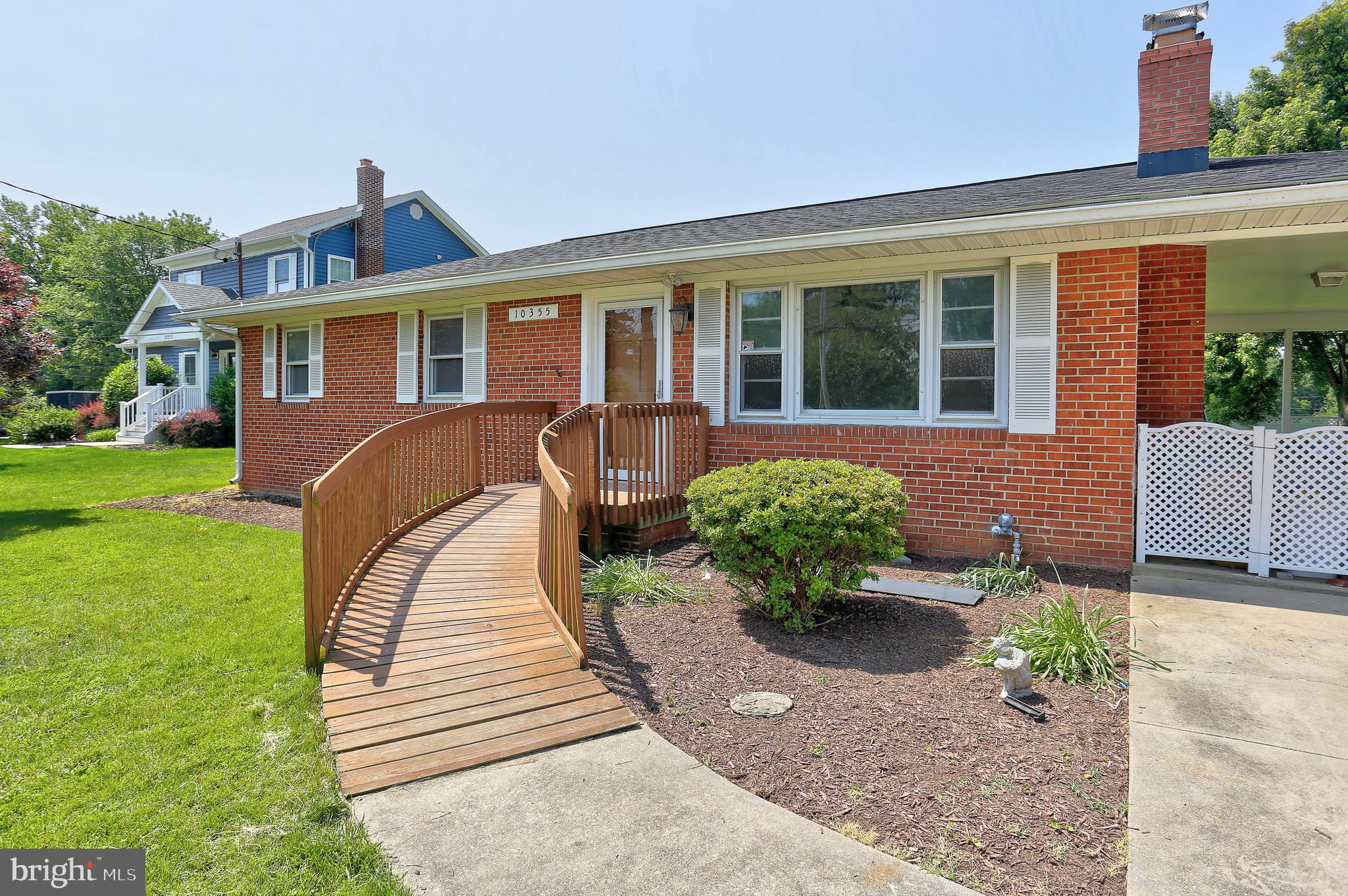 10355 Scaggsville Road Laurel, MD 20723 - Photo 36 of 41 a front view of a house with garden