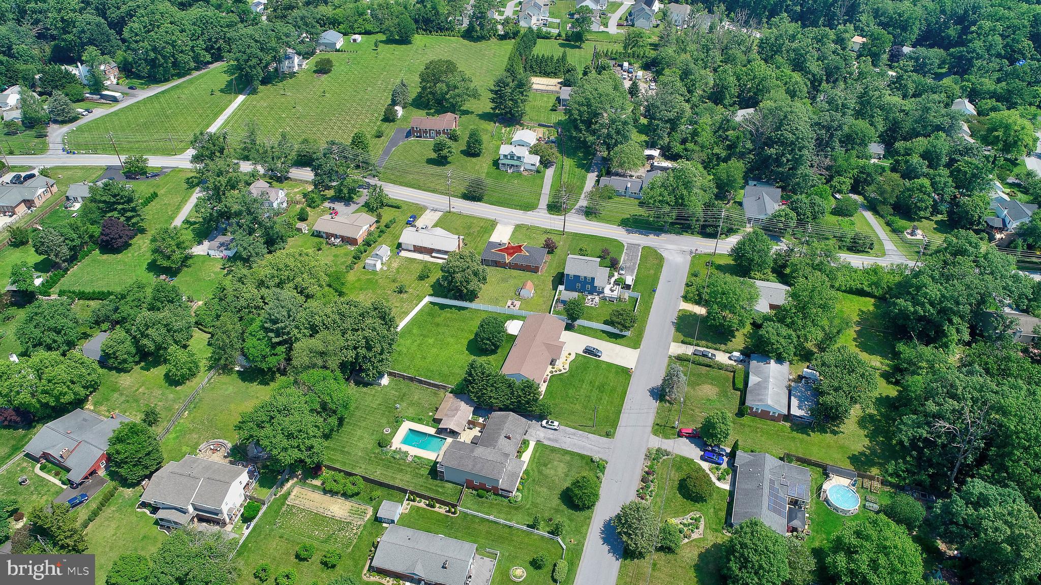 10355 Scaggsville Road Laurel, MD 20723 - Photo 41 of 41 an aerial view of house with swimming pool outdoor seating and yard