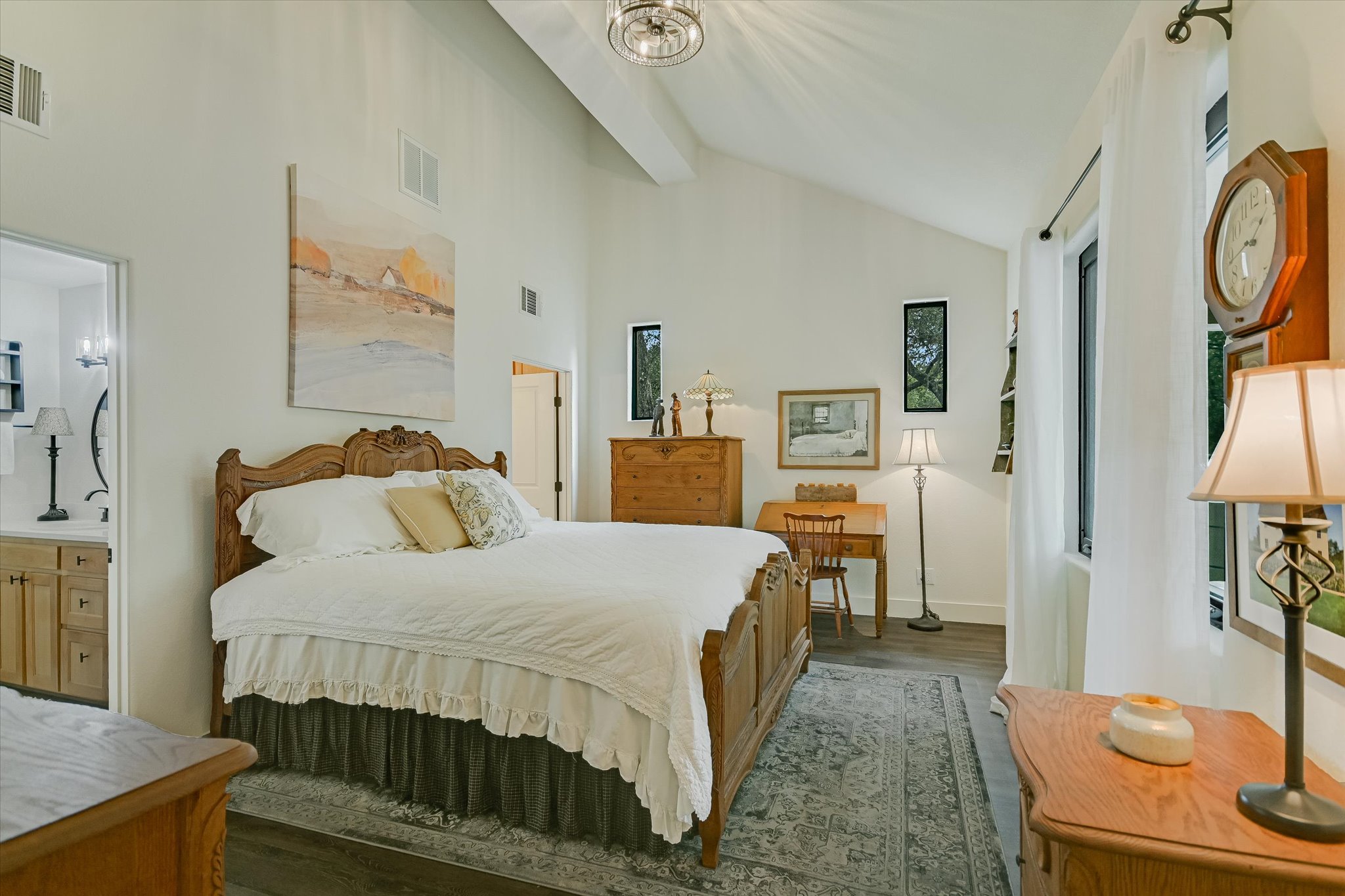 5 Sumac Court Wimberley, TX 78676 - Photo 14 of 26 a bedroom with a bed and a table in it