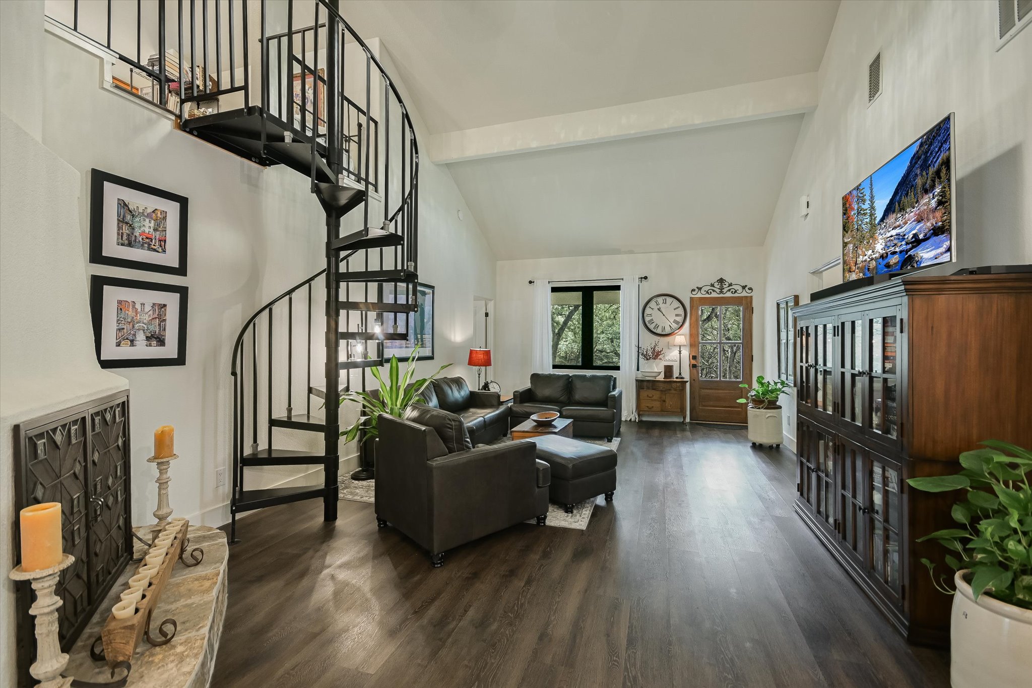5 Sumac Court Wimberley, TX 78676 - Photo 7 of 26 a living room with furniture or wooden floor and a flat screen tv