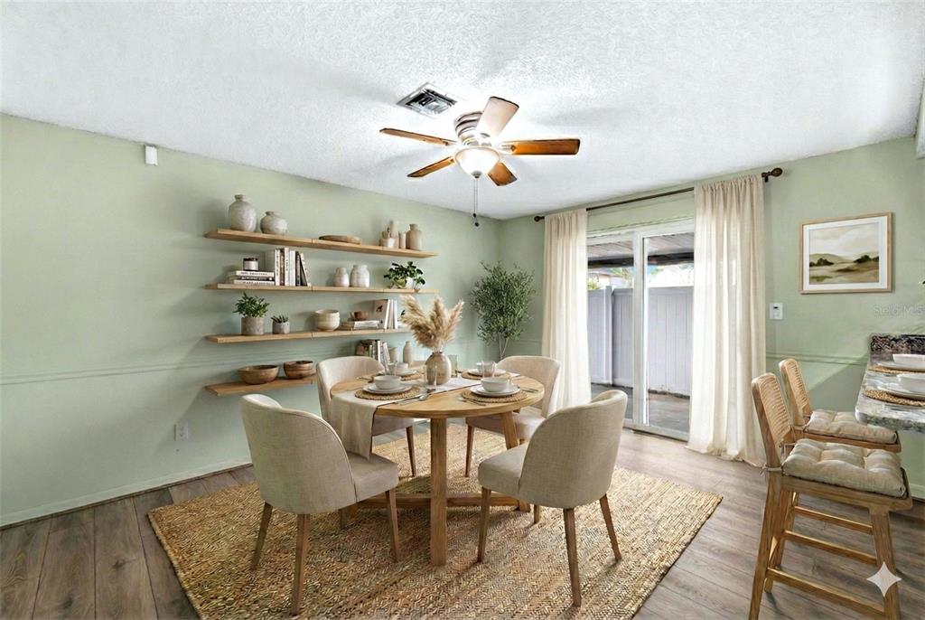 10187 122nd Avenue Largo, FL 33773 - Photo 17 of 48 a dining room with furniture and window