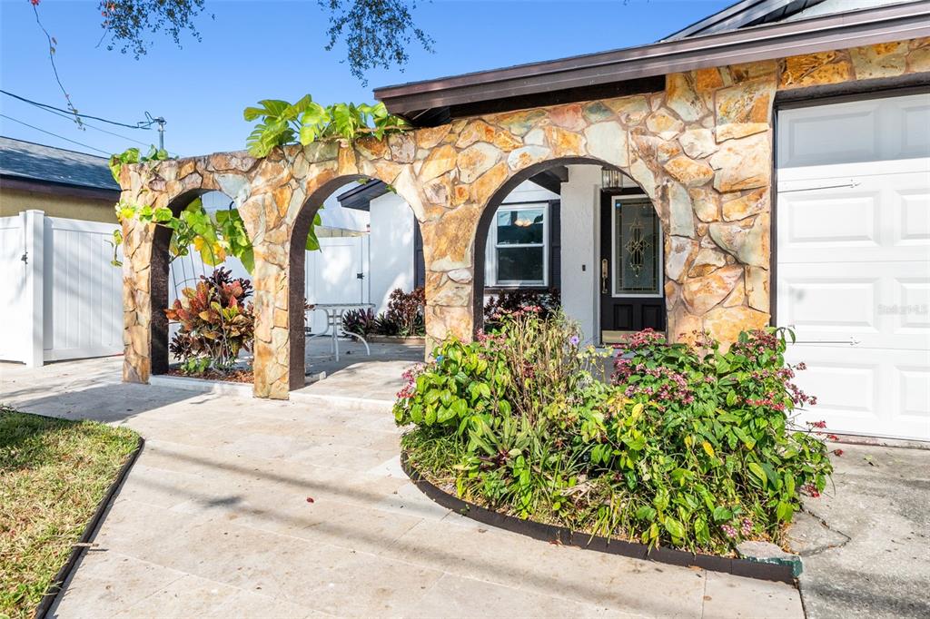10187 122nd Avenue Largo, FL 33773 - Photo 2 of 48 a view of entrance gate of the house