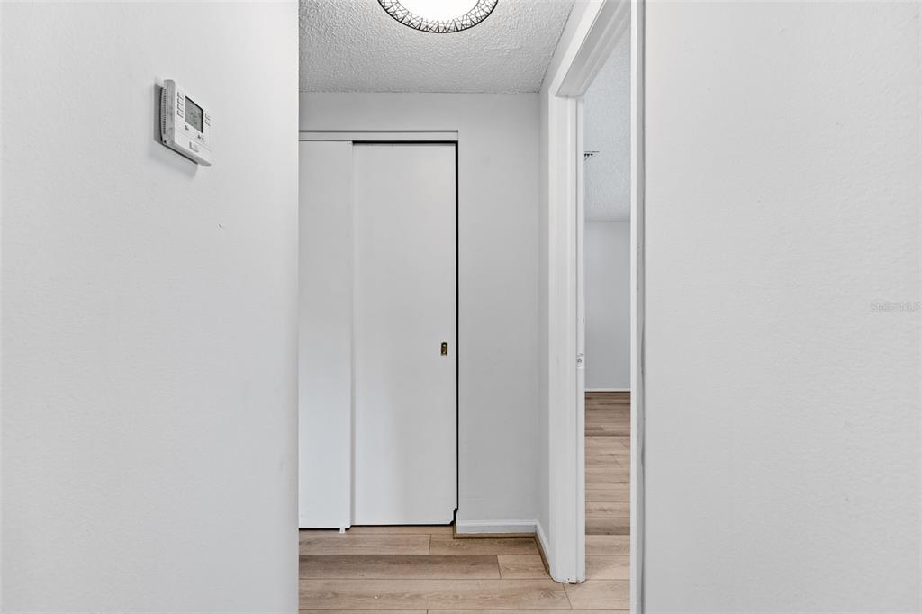 10187 122nd Avenue Largo, FL 33773 - Photo 29 of 48 a view of a hallway with wooden floor