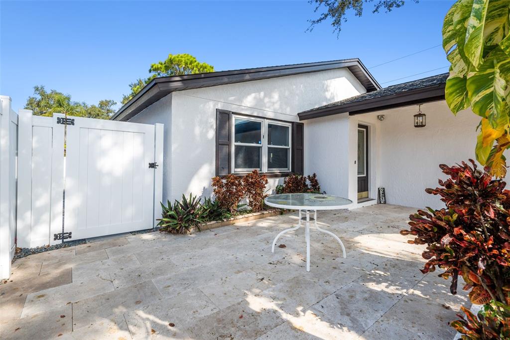 10187 122nd Avenue Largo, FL 33773 - Photo 3 of 48 a view of a house with backyard and sitting area