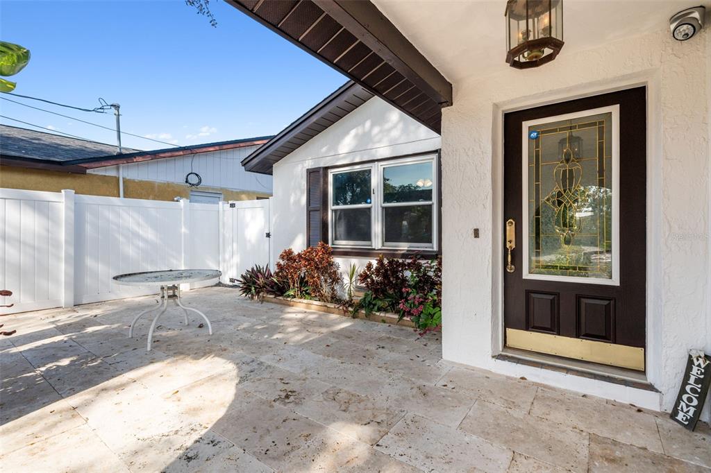 10187 122nd Avenue Largo, FL 33773 - Photo 5 of 48 a backyard of a house with yard and outdoor seating